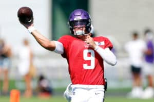 EAGAN, MINNESOTA - AUGUST 02: J.J. McCarthy #9 of the Minnesota Vikings participates in a drill during training camp on August 02, 2024 in Eagan, Minnesota.