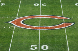 CHICAGO, ILLINOIS - NOVEMBER 24: A general view of the Chicago Bears midfield logo before the game against the Minnesota Vikings at Soldier Field on November 24, 2024 in Chicago, Illinois.