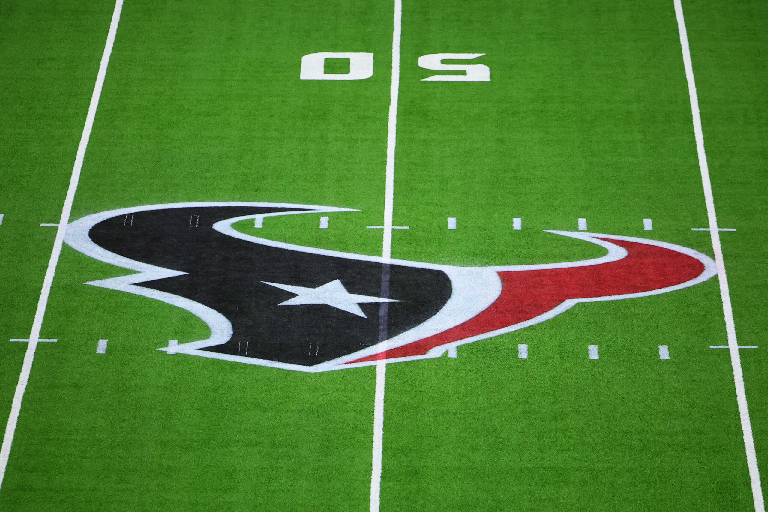 HOUSTON, TEXAS - NOVEMBER 10: The Houston Texans logo sits on the field prior to a game between the Houston Texans and the Detroit Lions at NRG Stadium on November 10, 2024 in Houston, Texas.