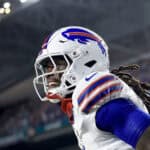 MIAMI GARDENS, FLORIDA - SEPTEMBER 12: James Cook #4 of the Buffalo Bills celebrates after scoring a touchdown against the Miami Dolphins during the first quarter in the game at Hard Rock Stadium on September 12, 2024 in Miami Gardens, Florida.